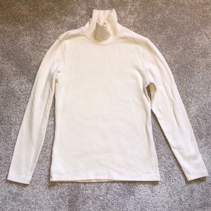 Eve’s Temptation Off White Long Sleeve Turtle Neck